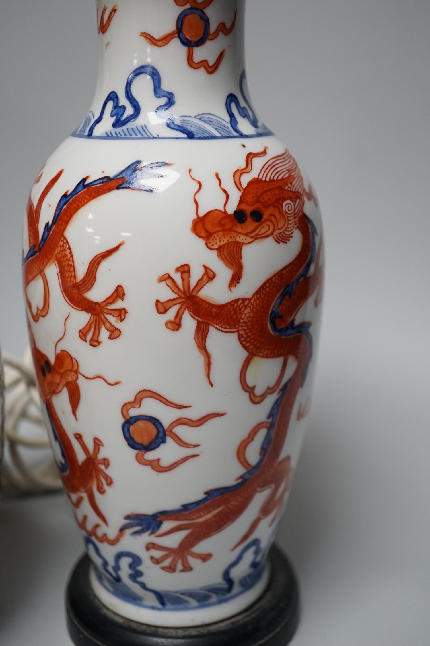 A group of Chinese famille rose jars, Paris porcelain lamps etc - tallest 34.5cm